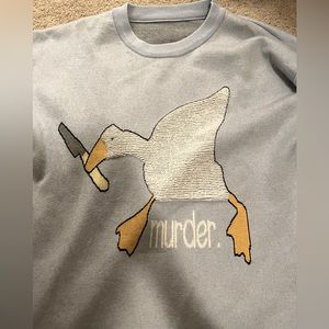 Duck murder sweater